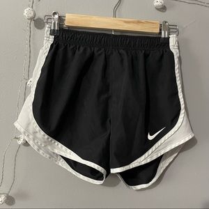 Black and white Nike running shorts